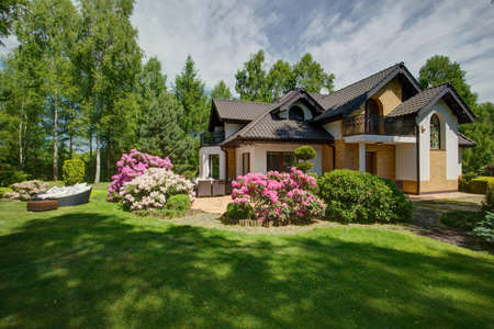 Exterior of detached house with beauty garden Exterior of detached house with beauty garden