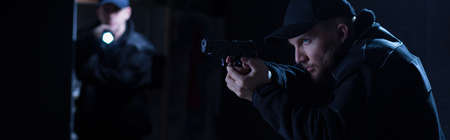 Two policemen are looking for the bandit