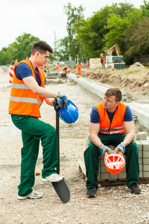 Builders taking break on a construction site