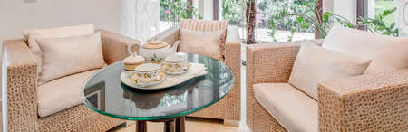 Cozy and tasteful armchairs in the houseの写真素材