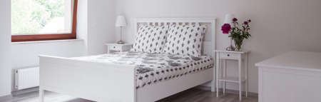 Modern and spacious bedroom with comfortable bed