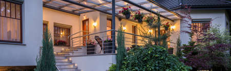 Front view on beautiful modern villa wit terraceの写真素材