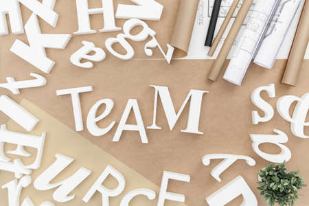 White words and letters on brown background