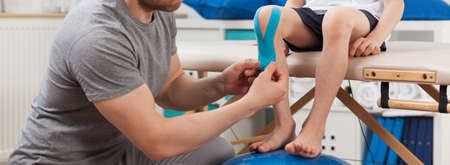Panorama of male physical therapist at workの写真素材