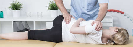 Young woman lying in the table at medical office