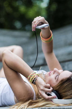 Picture of modern woman taking selfie on sunny dayの写真素材