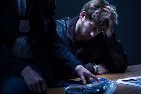 Close-up of evidence of crime in interrogation roomの写真素材