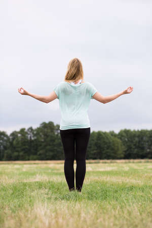 Picture of attractive blonde fit female living in harmonyの写真素材
