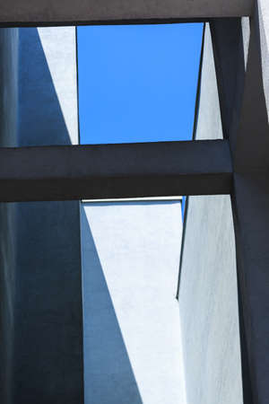 Close up of concrete minimalist urban skyscraper buildingの写真素材
