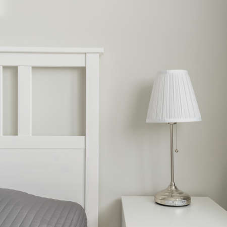 Close-up of space near bed designed in simple wayの写真素材