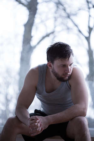 Picture of handsome stressed man waking up earlyの写真素材