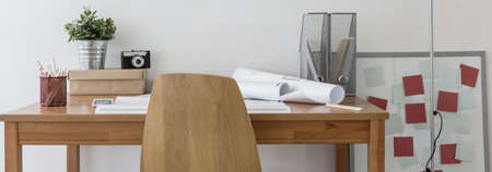 Wooden desk and chair in study roomの写真素材