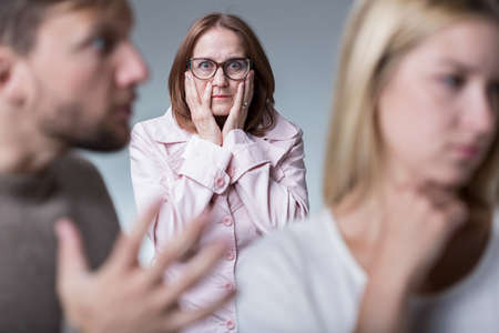 Mother-in-law interfering with young couple having argument