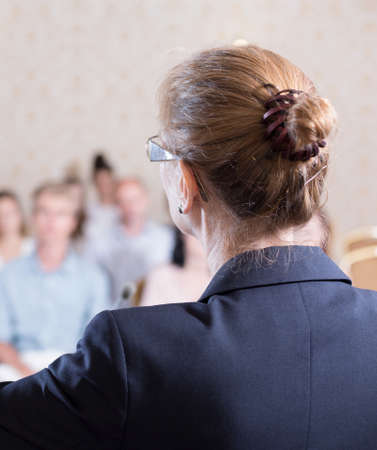 Close up of elegant woman speaking during party conventionの写真素材