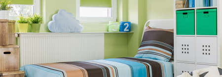 Sunny and cozy room for a boy in the house