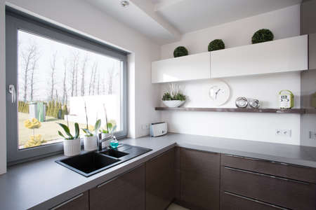 Window look from kitchen in contemporary houseの写真素材