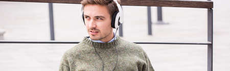 Young businessman is very bored at the stationの写真素材