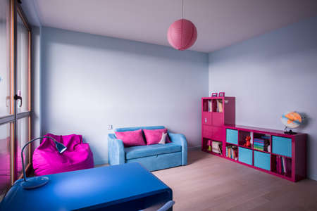 Blue and rose furniture in bedroom for little girlの写真素材