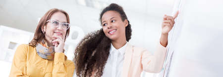 Horizontal view of positive relationship between coworkersの写真素材