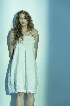 Image of sexually abused woman trying to get overの写真素材