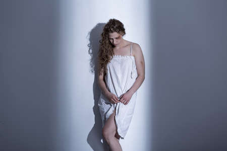 Picture of hopeless rape victim feeling guilt and shameの写真素材