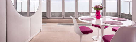 Panorama of elegant living room with round tableの写真素材