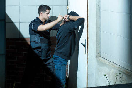 Police officer is very professional and brave in his workの写真素材