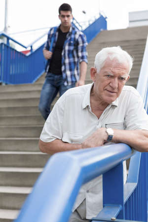 Vertical view of senior man feeling badの写真素材