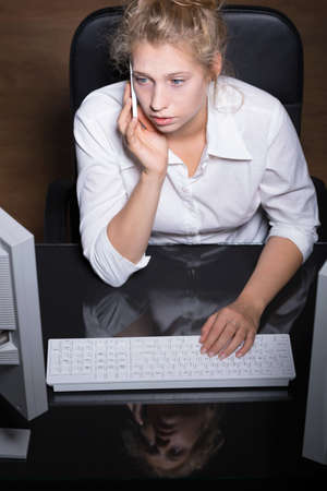 Picture of young female workplace mobbing victimの写真素材