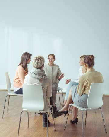 Personal trainer giving extracurricular activities for active womenの写真素材