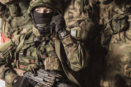 Close-up of military people on training groundの写真素材