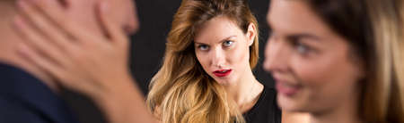 Beautiful crazy woman is jealous of ex-boyfriendの写真素材