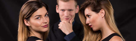 Panoramic photo of sexual love triangle relationshipの写真素材