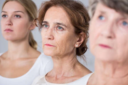 Aging process - three women in different ageの写真素材