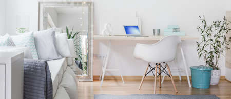 Panorama of contemporary room with big decorative mirrorの写真素材