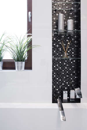 Close-up of black and white tiles in modern bathroomの写真素材