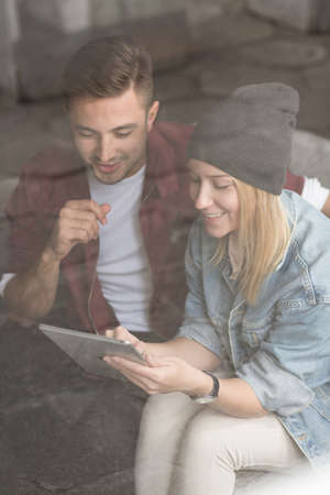 Smiling young couple having happy time togetherの写真素材