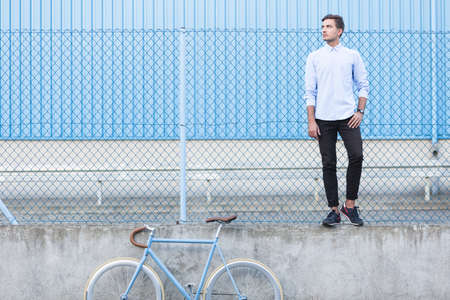 Picture of businessman standing on the ledgeの写真素材