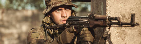 Sacred young warrior shooting from retreat