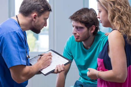 Picture of injured man with bruises at hospital