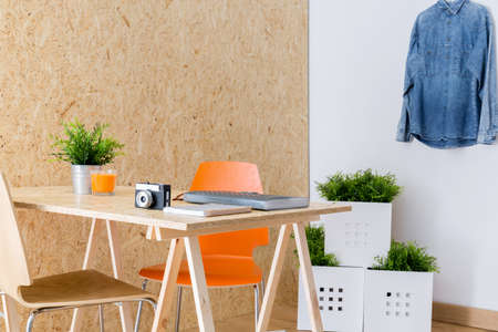 Camera on the table in photographer's roomの写真素材