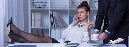 Young female boss is very severe and hardの写真素材