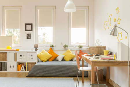 Light cozy teen room with color decorationsの写真素材