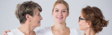 Three happy girls from different generations