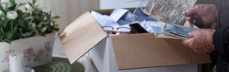 Widow takes out of the box old lettersの写真素材