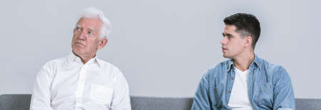 Conflict between stubborn father and adult sonの写真素材