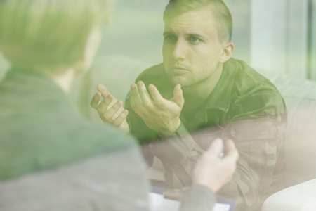 Image of war veteran after mental breakdown during psychiatric treatment