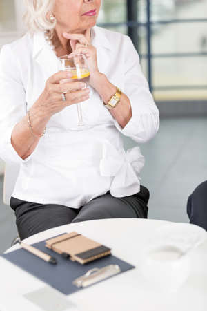 Elderly businesswoman director on an official meetingの写真素材
