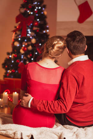Image of couple in love and warm magical xmas atmosphereの写真素材