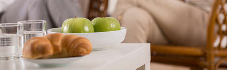 Delicious apples and croissant to eat for lunchの写真素材